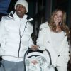 Mariah Carey et Nick Cannon, tout de blanc, sortent leurs jumeaux Monroe et Moroccan, à Aspen, pour le réveillon du 31 décembre 2011