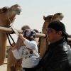 Steven Seagal, sa femme Elle, et son fils Kunzang, au festival du chameau à Al Dhafra, le 28 décembre 2011.