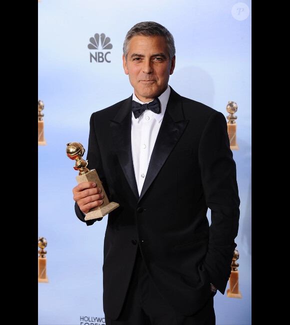 George Clooney, meilleur acteur pour The Descendants aux Golden Globes à Los Angeles, le 15 janvier 2012.