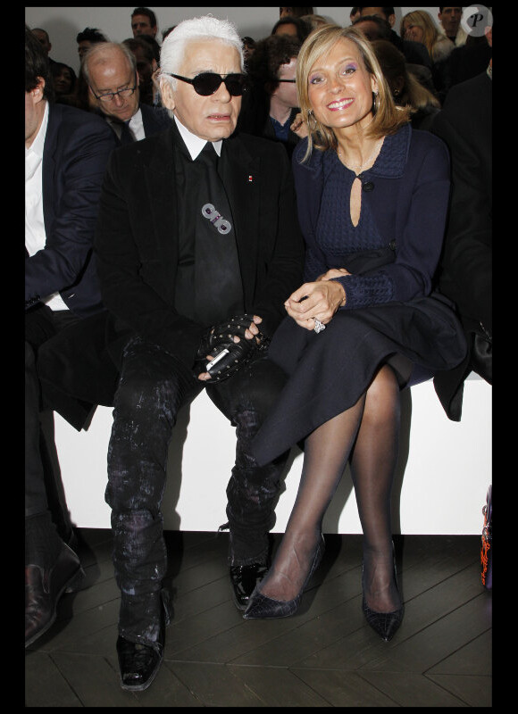 Karl Lagerfeld et Hélène Mercier-Arnault au premier rang du show Dior Homme à Paris, le 21 janvier 2012.