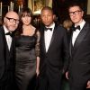 Monica Bellucci entourée de Dolce & Gabbana ainsi que Pharrell Williams 