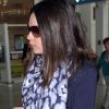 Mila Kunis vient d'arriver à Paris. Ici, à l'aéroport Paris-Charles-de-Gaulle le 28 février 2012