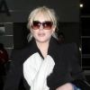 Lindsay Lohan, en compagnie de sa soeur Ali, à l'aéroport JFK de New York, avant d'embarquer pour vol pour Los Angeles, le lundi 5 mars 2012.