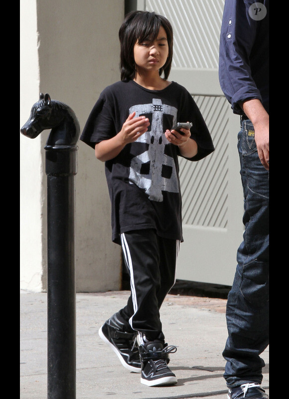 Maddox, fils aîné d'Angelina Jolie et Brad Pitt, à la Nouvelle-Orléans le 7 mars 2012