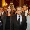 Jean Todt, Carla Bruni, Nicolas Sarkozy et Michelle Yeoh à la cérémonie organisée à l'Élysée où le président a décoré onze  personnalités du monde des arts et du spectacle, le 14 mars 2012.