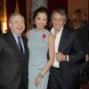 Jean Todt, Michelle Yeoh et Richard Anconina à la cérémonie organisée à l'Élysée où le président a décoré onze  personnalités du monde des arts et du spectacle, le 14 mars 2012.