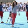 Catherine, duchesse de Cambridge a montré ses talents de hockeyeuse lors de sa rencontre avec l'équipe olympique britannique à l'Arena Riverside, sur le site des JO de Londres, le 15 mars 2012.