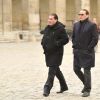 Florent Emilio Siri et Benoît Magimel lors de l'hommage à Pierre Schoendoerffer aux Invalides à Paris le 19 mars 2012