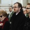 Patricia Schoendoerffer, sa veuve, Frédéric et Ludovic, ses fils, lors de l'hommage religieux à Pierre Schoendoerffer aux Invalides à Paris le 19 mars 2012