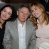Roman Polanski, Emmanuelle Seigner et Diane de Mac Mahon, la femme de Guillaume Durand, à la soirée bavaroise organisée en l'honneur d'Axel Ganz, le 15 mars 2012.