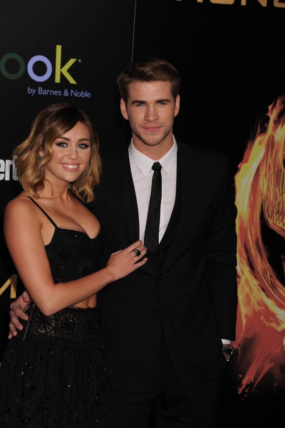 Miley Cyrus et Liam Hemsworth à l'avant-première de The Hunger Games à Los Angeles le 12 mars 2012