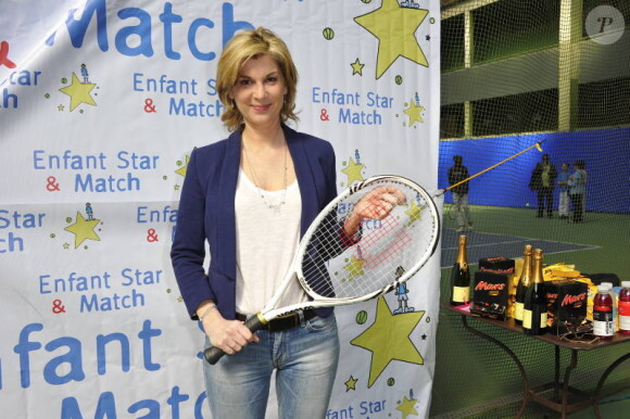 Michèle Laroque lors du tournoi de tennis pour l'association Enfant Star et Match à Paris le 26 mars 2012