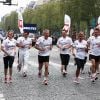 Patrick Poivre-d'Arvor lors des Kilomètres du Coeur, en plein Marathon de Paris le 15 avril 2012