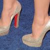 Carmen Electra brillait lors de la soirée Hot Hollywood Style grâce à ses souliers Bibi par Christian Louboutin. West Hollywood, le 18 avril 2012.