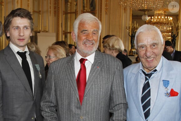Stanislas Merhar, Jean-Paul Belmondo et Charles Gérard, à Paris le 20 avril 2012.