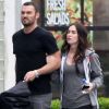 Megan Fox et Brian Austin Green dans les rues de Los Angeles le 22 avril 2012. La comédienne n'affiche pas vraiment un ventre de femme enceinte et fait taire les rumeurs de grossesse...
