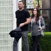 Megan Fox et Brian Austin Green dans les rues de Los Angeles le 22 avril 2012. La comédienne n'affiche pas vraiment un ventre de femme enceinte et fait taire les rumeurs de grossesse...
