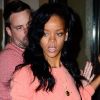 Rihanna à la sortie d'un studio d'enregistrement, surprise à la vue de son disque de platine, remis pour Talk That Talk. New York, le 1er mai 2012.