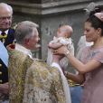  Baptême de la princesse Estelle, au palais royal Drottningholm, à Stockholm, le 22 mai 2012. 
 Chris O'Neill, compagnon de la princesse Madeleine de Suède depuis début 2011, et Sofia Hellqvist, compagne du prince Carl Philip de Suède depuis avril 2010, étaient présents. 