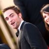 Robert Pattinson et Juliette Binoche montent les marches pour la présentation du film Cosmopolis, à Cannes le 25 mai 2012