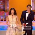 Audrey Tautou et Adrien Brody remettent la Palme d'Or, lors de la cérémonie de clôture du 65e Festival de Cannes, le dimanche 27 mai 2012.