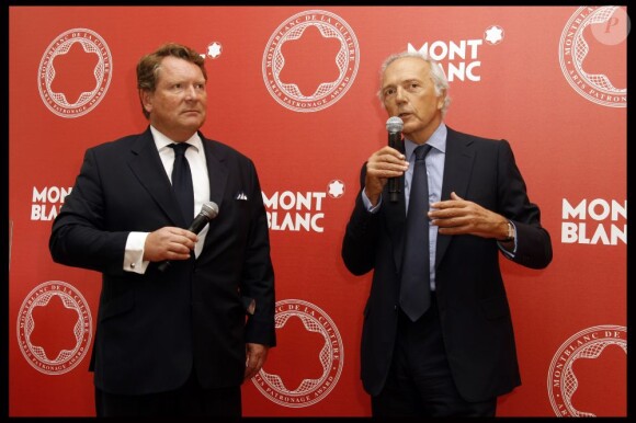 Edouard Carmignac et Michel Adé lors de la soirée de remise du prix Montblanc, le 5 juin 2012.