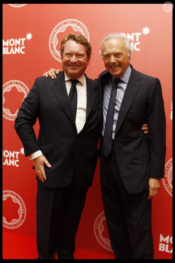 Edouard Carmignac et Michel Adé lors de la soirée de remise du prix Montblanc, le 5 juin 2012.