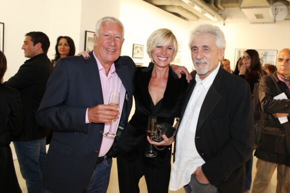 Stéphane Collaro, Sophie Davy et Daniel Angeli au vernissage de son exposition Icônes à la galerie Art District à Paris, le 6 juin 2012.