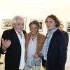 Richard Anconina, Farid Lahouassa et Daniel Angeli au vernissage de son exposition Icônes à la galerie Art District à Paris, le 6 juin 2012.