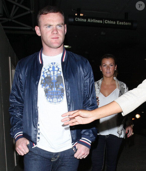 Wayne Rooney et sa femme Coleen débarquent à Los Angeles pour quelques jours le mardi 26 juin 2012
