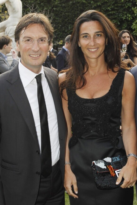 Pietro Beccari et sa femme Elisabetta à la présentation de la collection Berluti Printemps-Ete 2013 au Palais Royal, à Paris, le 29 juin 2012.