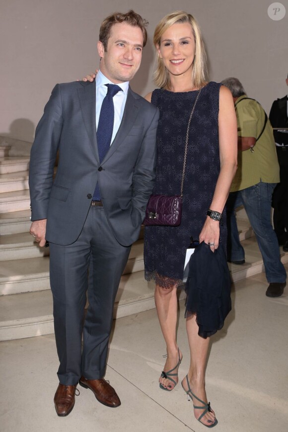 La journaliste Laurence Ferrari et Renaud Capuçon au très attendu défilé Dior Haute Couture, Automne-Hiver 2012-2013, à Paris, le 2 juillet 2012.