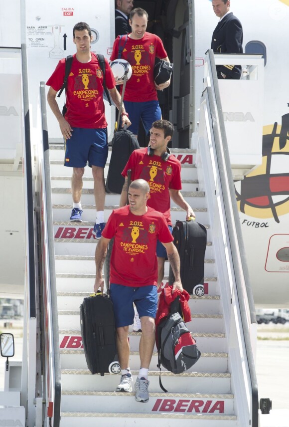 L'équipe d'Espagne le 2 juillet 2012 à Madrid lors de la descente d'avion en provenance de Kiev après avoir glané un nouveau titre de champion d'Europe