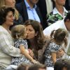 Les jumelles de Roger Federer, Charlene Riva et Myla Rose, ont assisté au triomphe de leur papa à Wimbledon le 8 juillet 2012 en compagnie de leur maman Mirka et leur grand-mère Lynette
