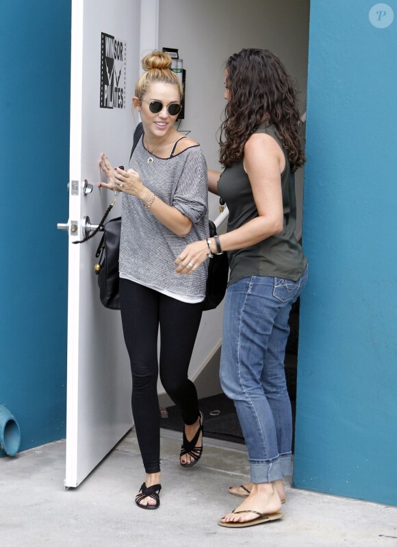 Miley Cyrus sort d'une séance de sport et montre son nouveau tatouage sur son avant-bras, le 12 juillet 2012 à Los Angeles