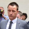 John Terry, à la sortie du tribunal après avoir été acquité dans une affaire d'insultes racistes à l'encontre d'Anton Ferdinand le 13 juillet 2012 à Londres