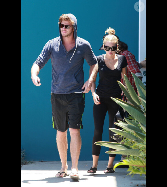 Miley Cyrus et Miley Cyrus quittent une salle de sport, le lundi 16 juillet à Los Angeles.