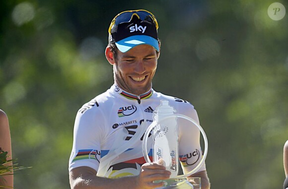 Mark Cavendish pouvait sourire après s'être imposé lors de la dernière étape du Tour de France 2012 sur les Champs Élysées le 22 juillet 2012