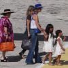 Laeticia Hallyday, Mamie Rock, Jade et Joy, arrivent sous le beau soleil de Saint-Barthélémy, le vendredi 27 juillet 2012.