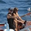 Christian Audigier et Nathalie Sorensen s'offrent une petite balade en bateau à Saint-Tropez, le dimanche 29 juillet 2012.