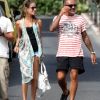 Christian Audigier se promène à Saint-Tropez avec sa compagne Nathalie Sorensen, le dimanche 29 juillet 2012.