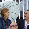 Ambiance au beau fixe malgré la pluie entre la princesse Beatrice d'York et son boyfriend Dave Clark dans les gradins de Greenwich Park le 3 août 2012, lors du Grand Prix de la compétition de dressage des Jeux olympiques de Londres.