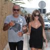 Décidés à faire la fête, Christian Audigier et sa douce Nathalie Sorensen se baladent à Ibiza le 9 août 2012