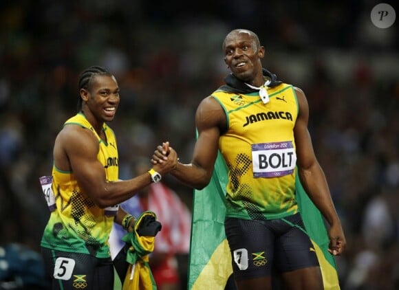 Yohan Blake et Usain Bolt à l'issue de la finale du 100m le 5 août 2012 à Londres