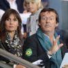 Jean-Luc Reichmann et sa femme Nathalie lors du match du PSG face à Bordeaux le 26 août 2012 à Paris