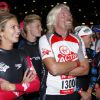 Richard Branson et sa fille Holly participent au Virgin Active Triathlon, à Londres, le samedi 22 septembre 2012.