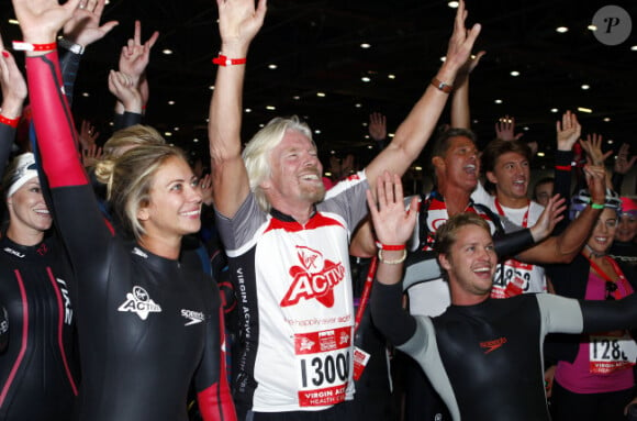 Richard Branson et sa fille Holly participent au Virgin Active Triathlon, à Londres, le samedi 22 septembre 2012.