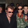 Johnny Hallyday et Laeticia à leur arrivée à l'aéroport de Paris Charles-de-Gaulle, le 9 octobre 2012.