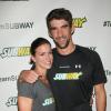 Whitney Phelps et Michael Phelps lors du Subway Official Training Restaurant of the Phelps Family au Sport Center situé au Chelsea Piers de New York le 15 octobre 2012