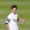 Louis Tomlinson, du groupe One Direction, participe à un match de charité, le lundi 22 octobre à Doncaster, en Angleterre.